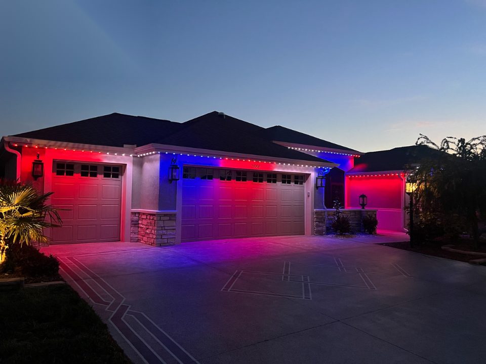 Garage and entry washed in red and blue permanent lighting